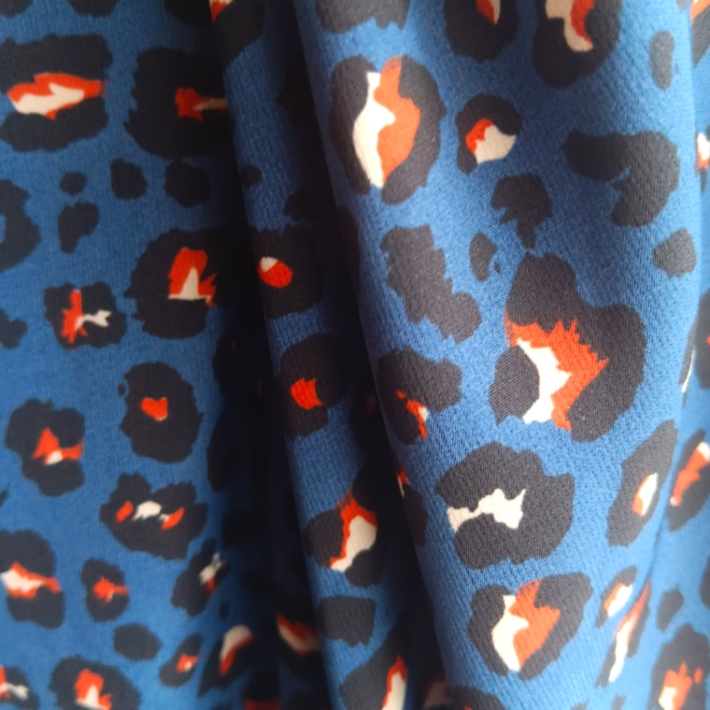 Nice light free style cool cheetah print elbow sleeve dress. Small